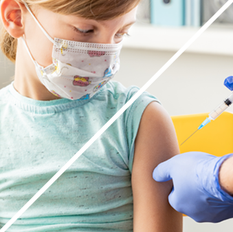 Child wearing mask receiving shot in arm